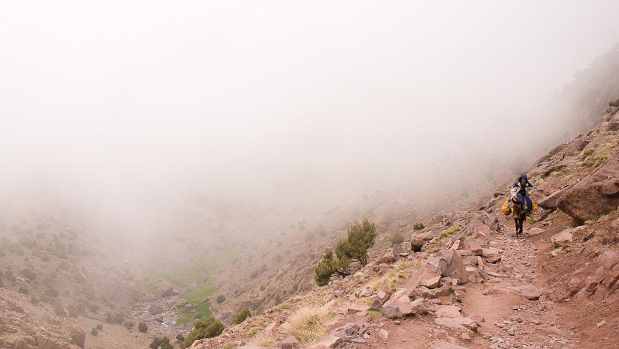 Fog coming up Jebel Toubkal, High Atlas Mountains